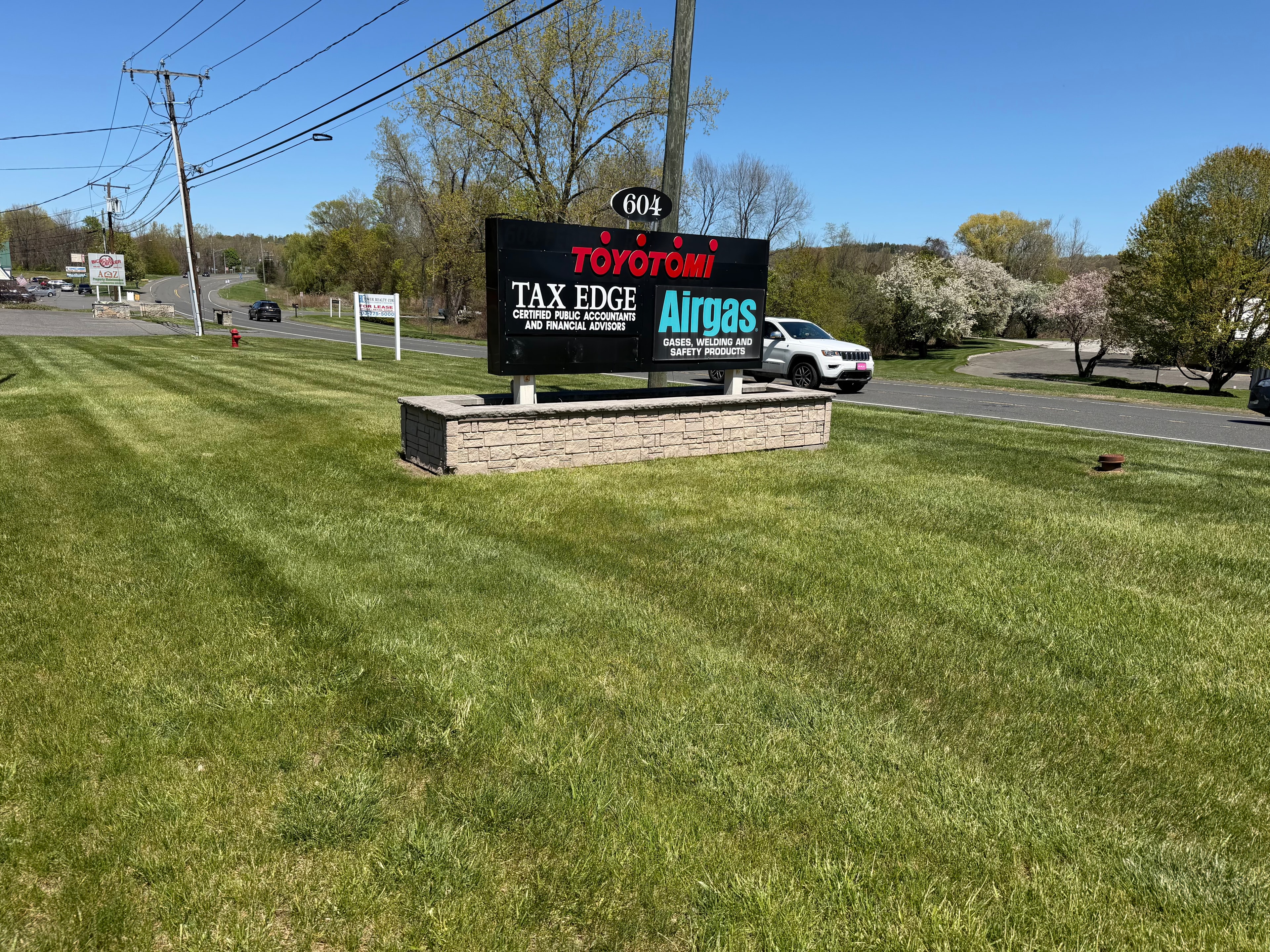 Tax Edge sign in spring